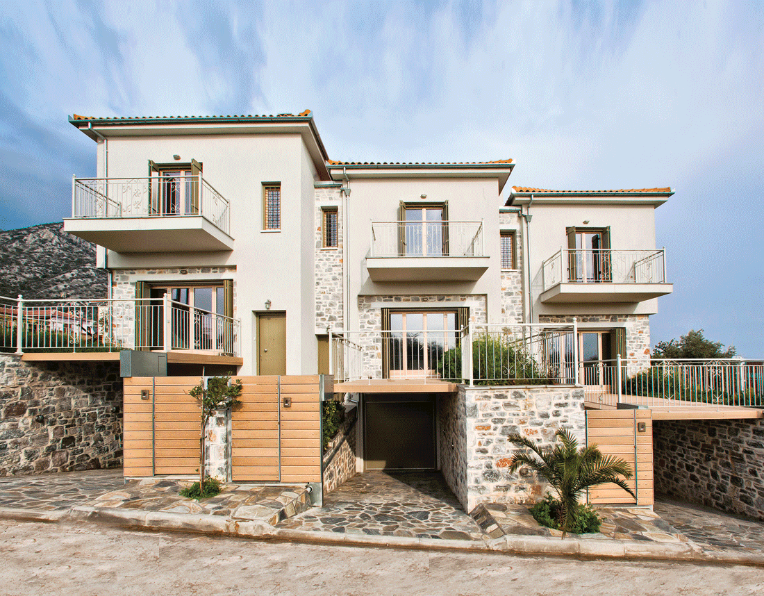 Façade of a passive house in Agria by XG Group of Engineers
