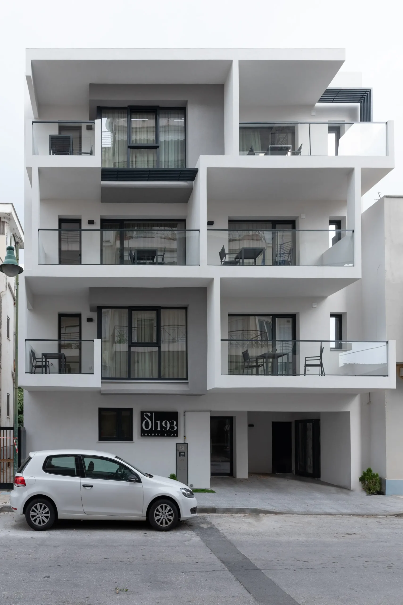 Street-level exterior view of the apartment building on 193 Konstanta Street, showing its full façade designed by XG Group of Engineers.