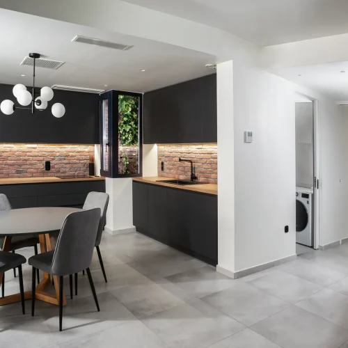 Renovated interior space by XG Group of Engineers in Volos